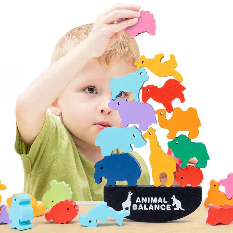 Toddler learning balance and problem solving using Montessori animal stacking toy
